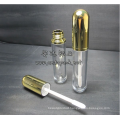 gold round lip gloss tube